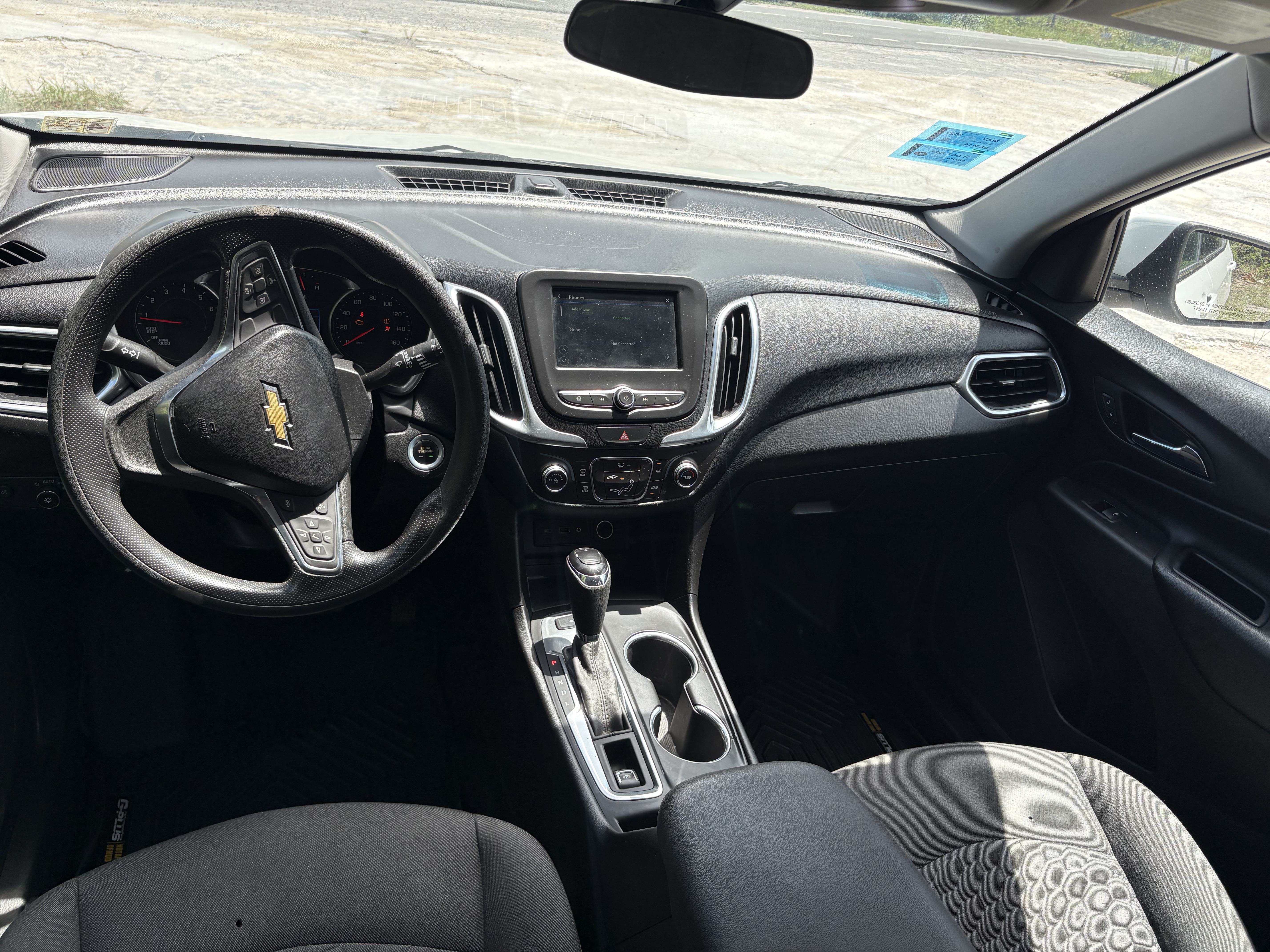 Driver cabin — steering wheel and center console