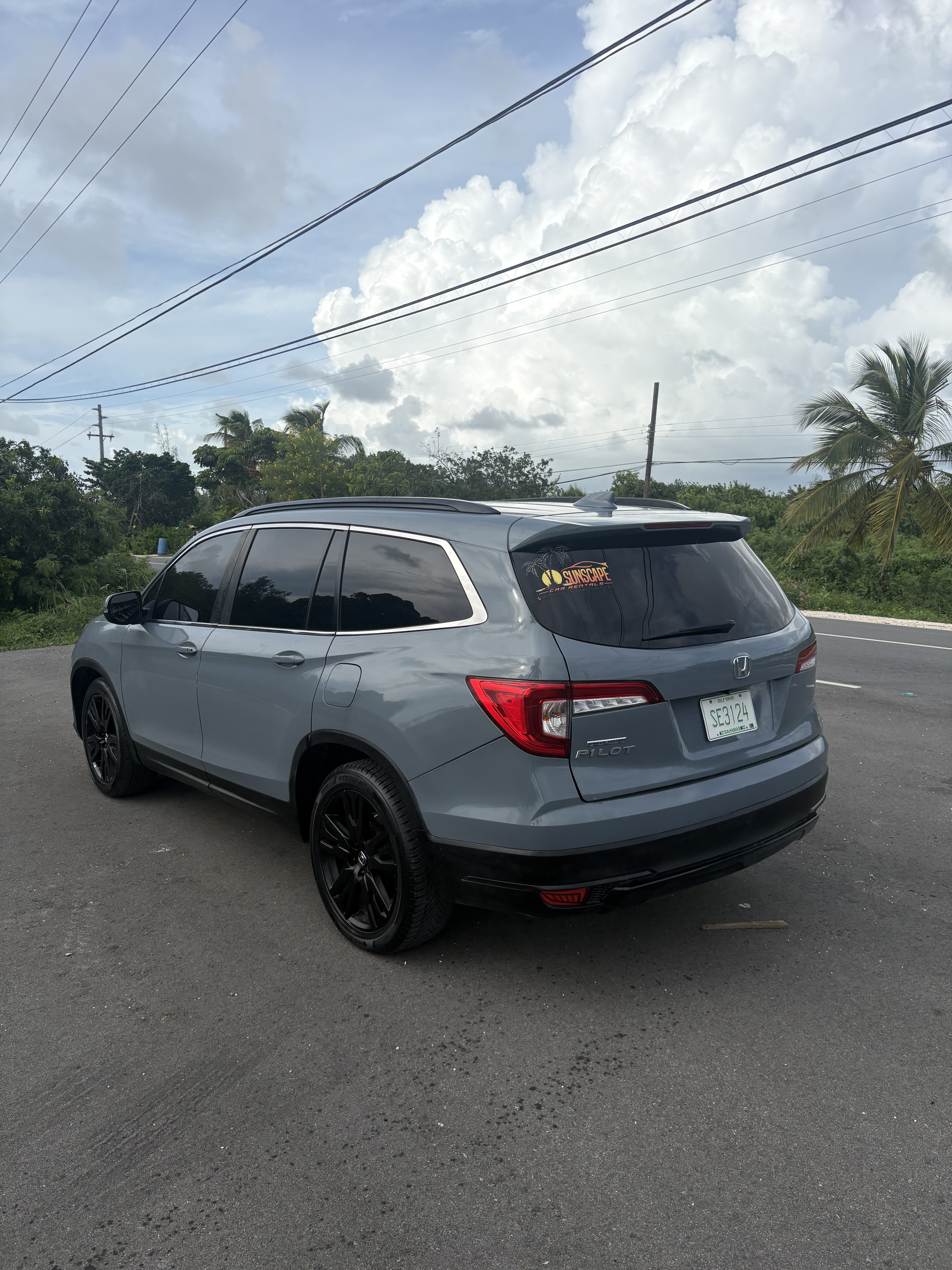 Honda Pilot premium SUV — rear three-quarter view